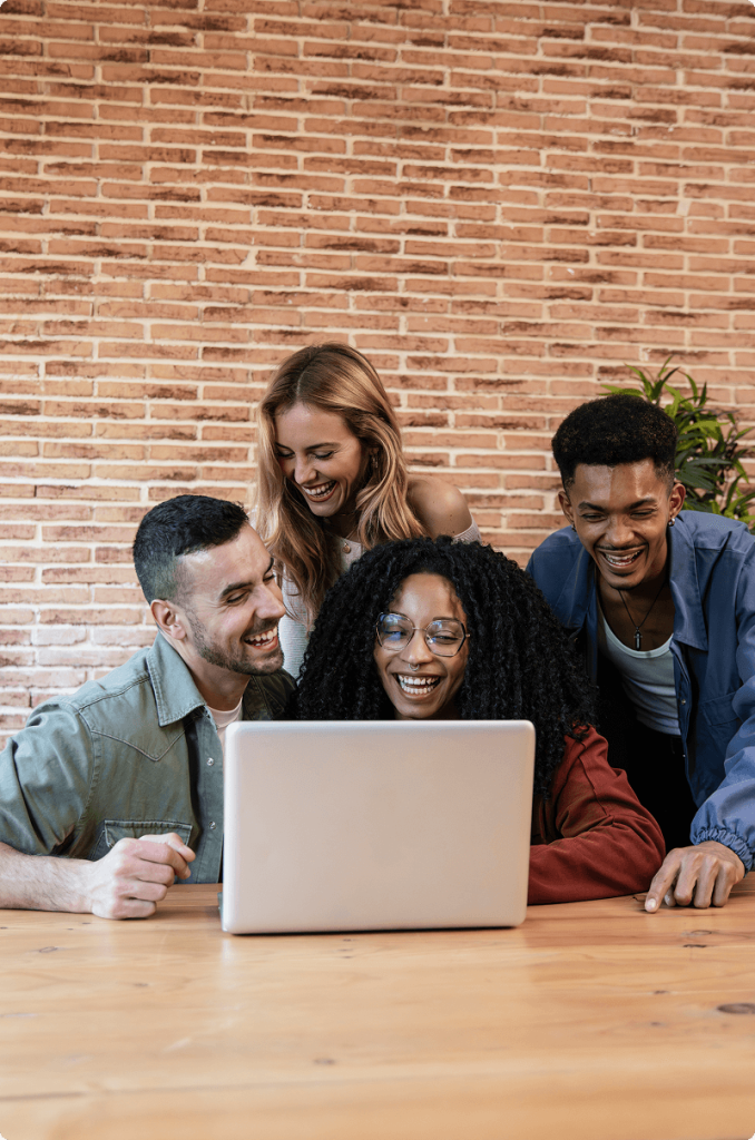 Diverse group of young friends working together.