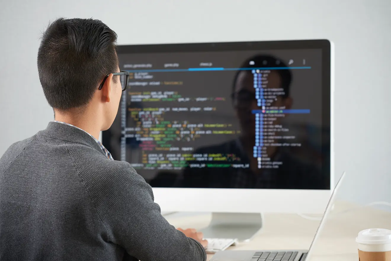 Developer looking at code